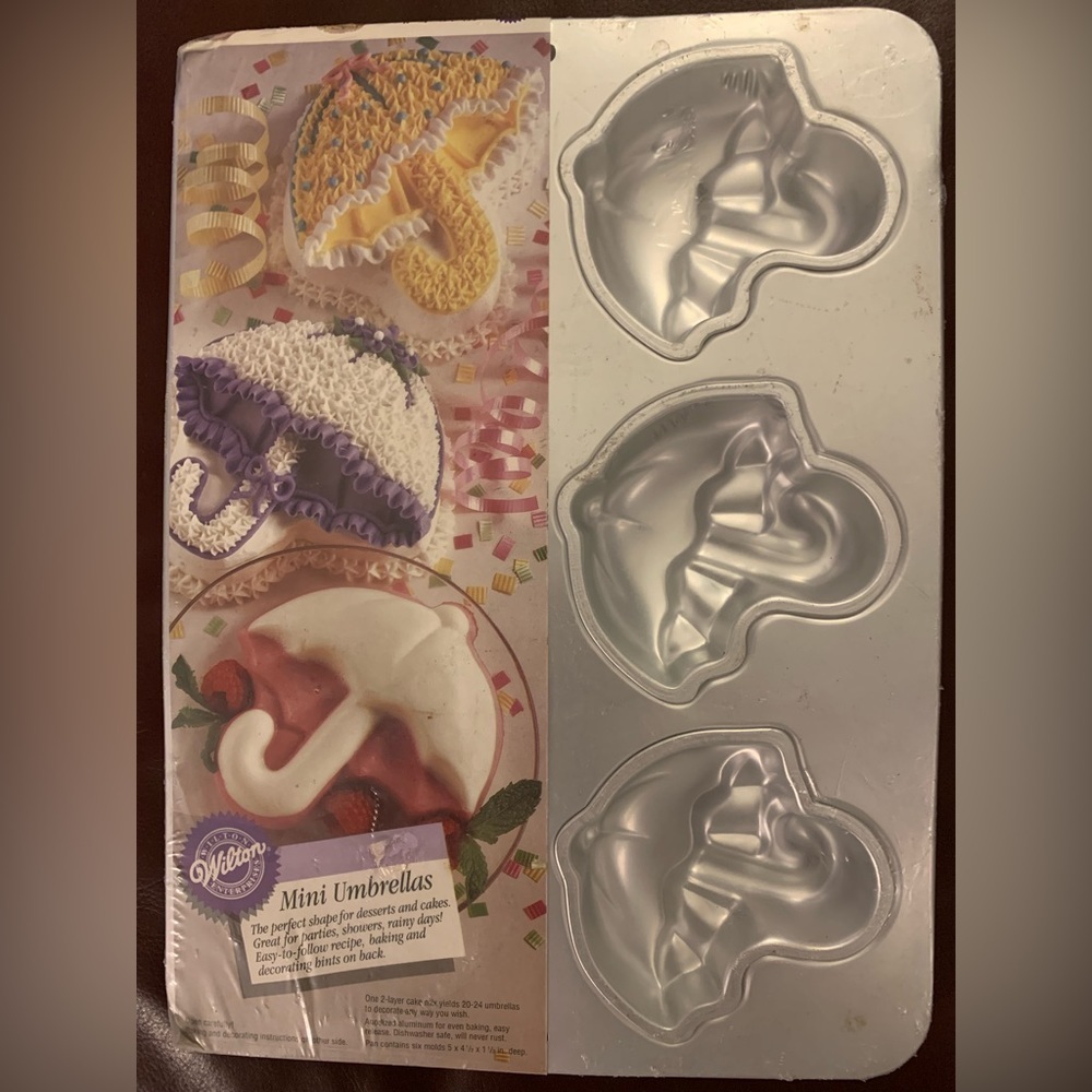 Wilton Mini Umbrellas Cake Pan. New! 6-cavity. Pkg. showing a little wear.